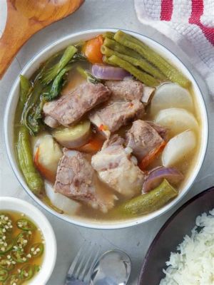  Sinigang na Baboy : Un plat épicé et réconfortant qui réchauffe l'âme !